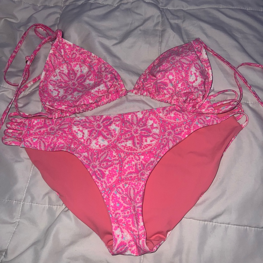 All pink with a little bit of blue swimsuit